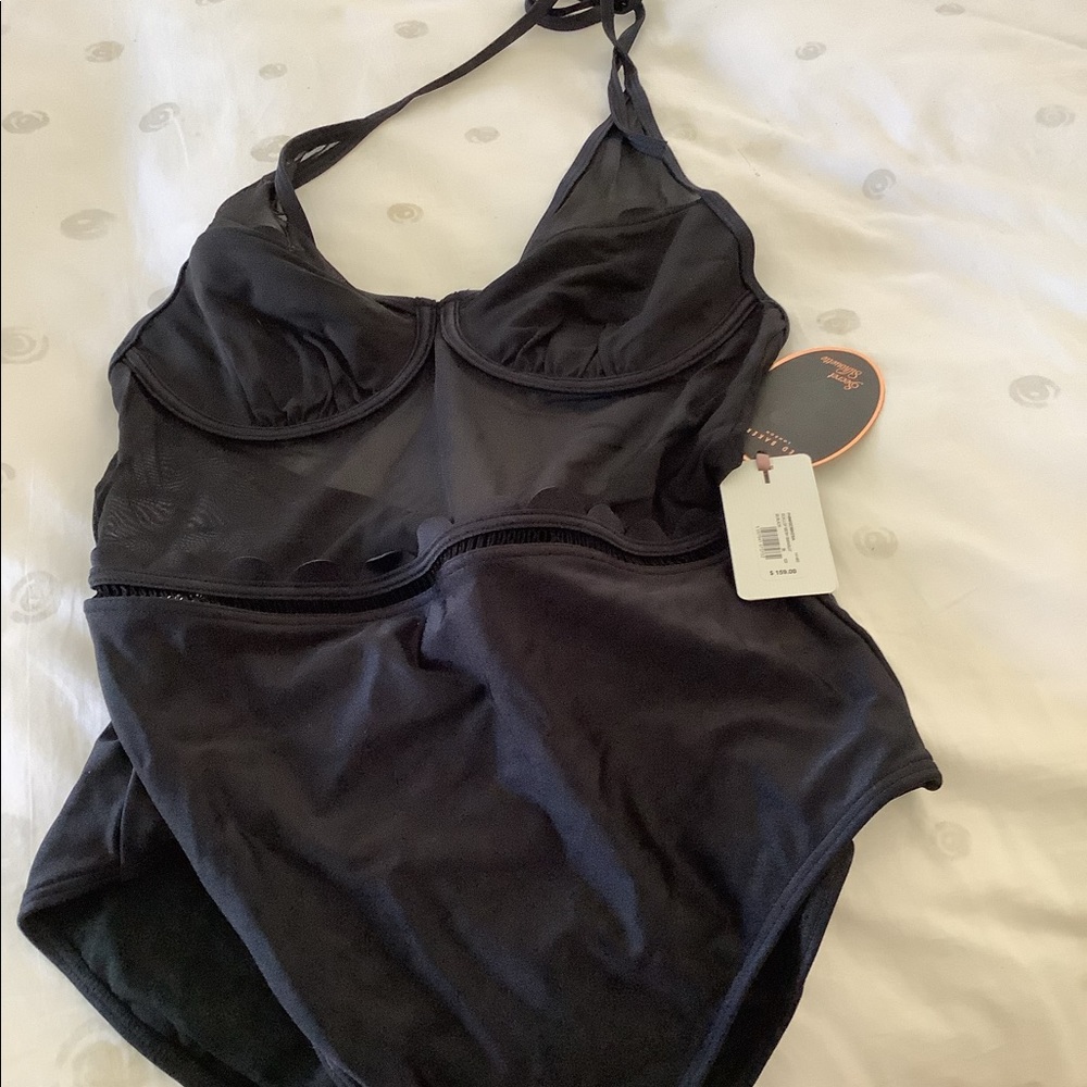 New bathing suit-tags on